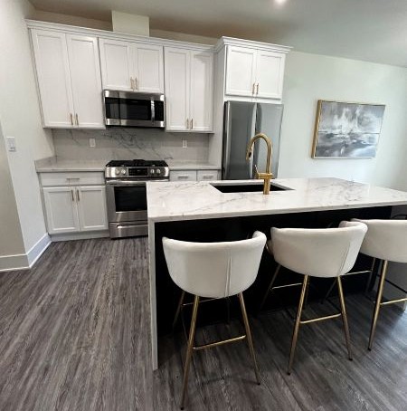 How Cabinet Painting Helps Stretch a Kitchen Remodeling Budget